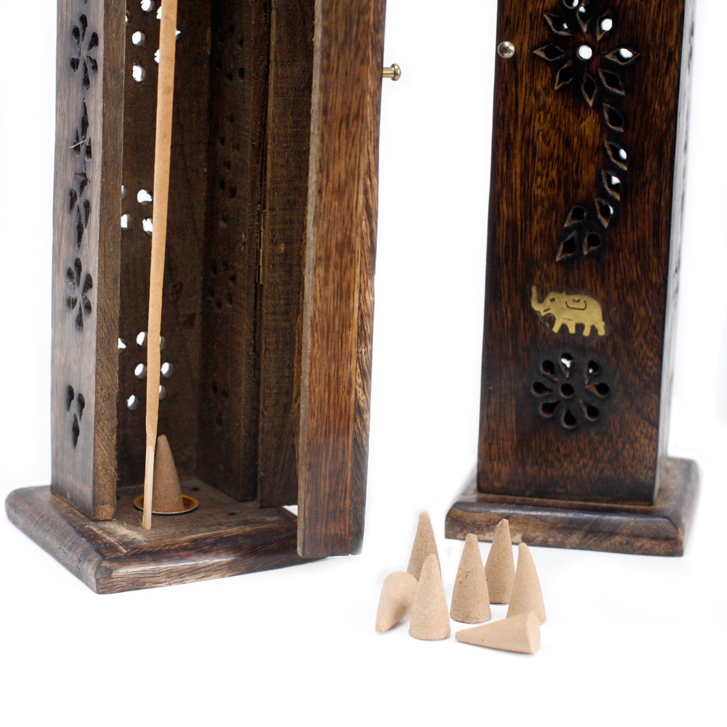 Image shows 2 mango wooden boxs, intricate engraving with 2 elephants on each piece engraved with brass, incense sticks, incense cones holder, burner. For home fragrance and decoration in the home. Close up with door open and cones scattered around