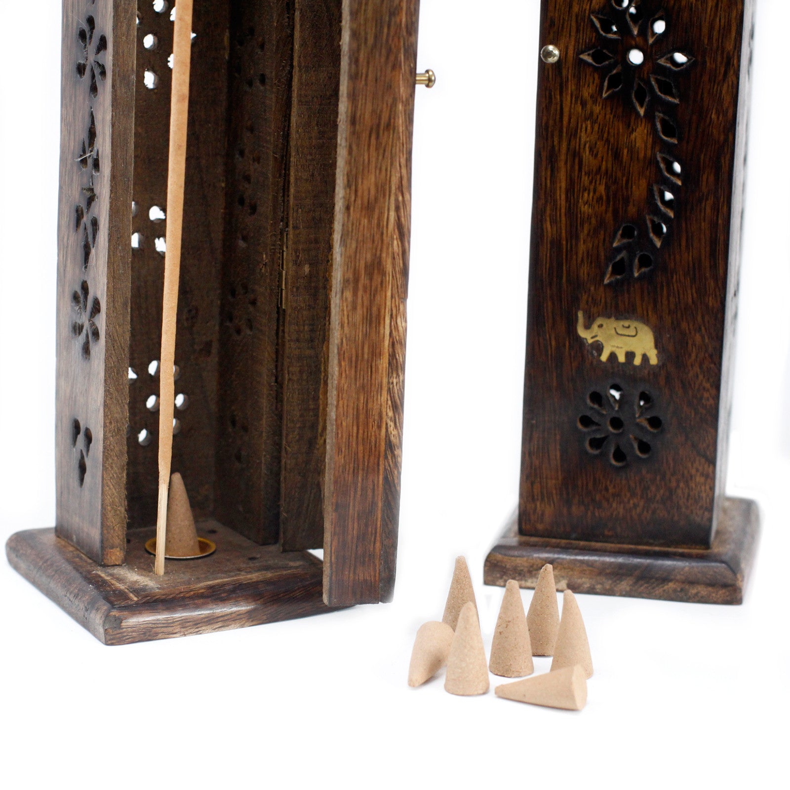 Image shows 2 mango wooden boxs, intricate engraving with 2 elephants on each piece engraved with brass, incense sticks, incense cones holder, burner. For home fragrance and decoration in the home. Close up with door open and cones scattered around