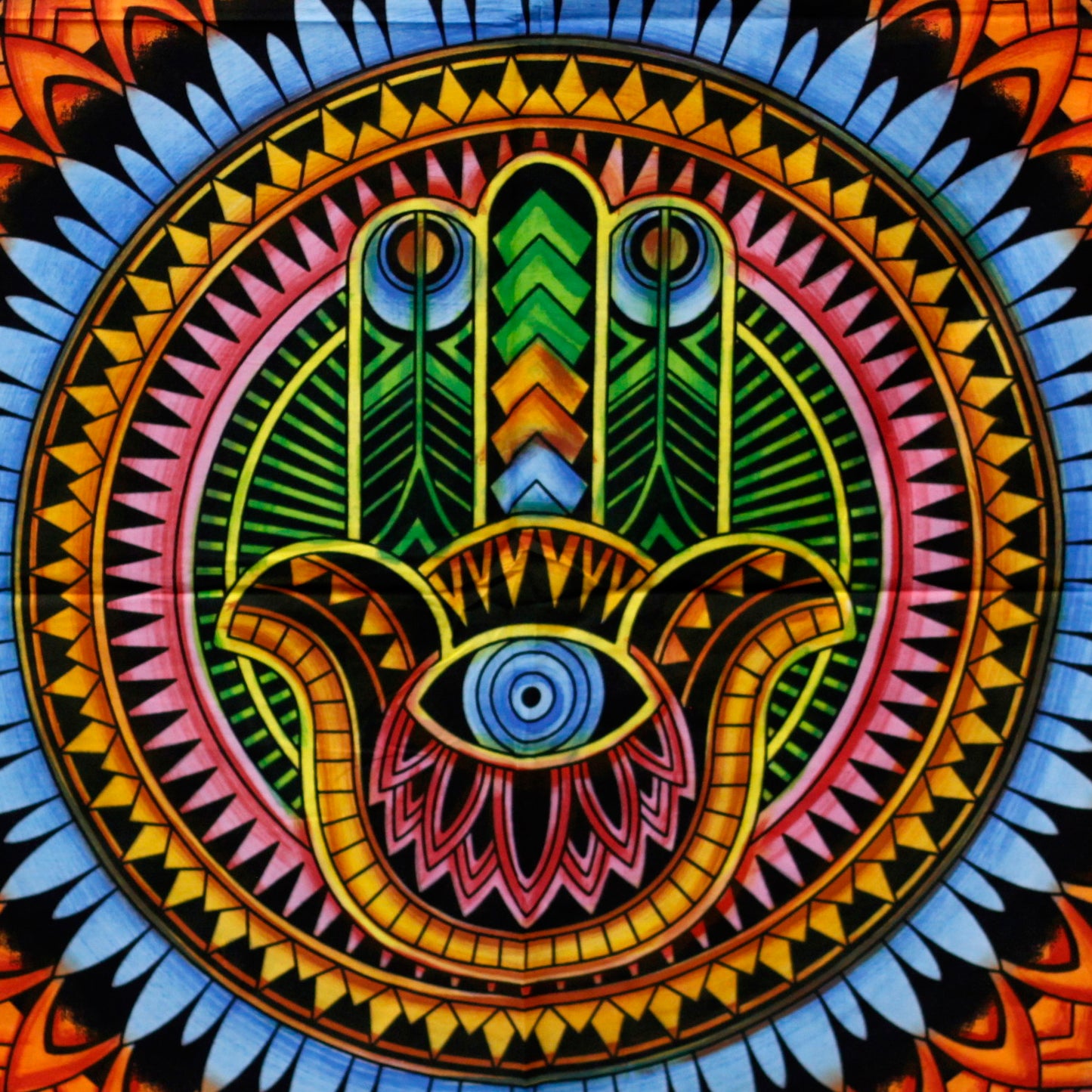 Close up of the large hamsa hand, fine detail vibrant colours