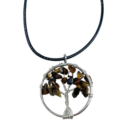 Image of a women's tree of life pendant featuring beautiful Tiger Eye gemstones, symbolizing elegance and sophistication. Front close up image.