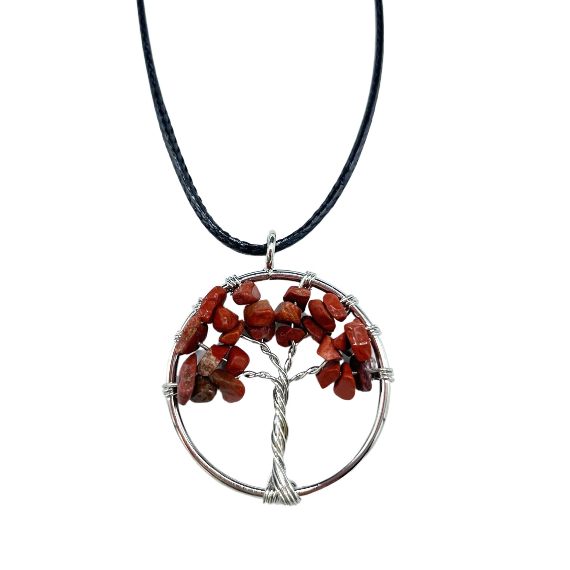 Image of a women's tree of life pendant featuring beautiful Red Jasper gemstones, symbolizing elegance and sophistication. Front close up image