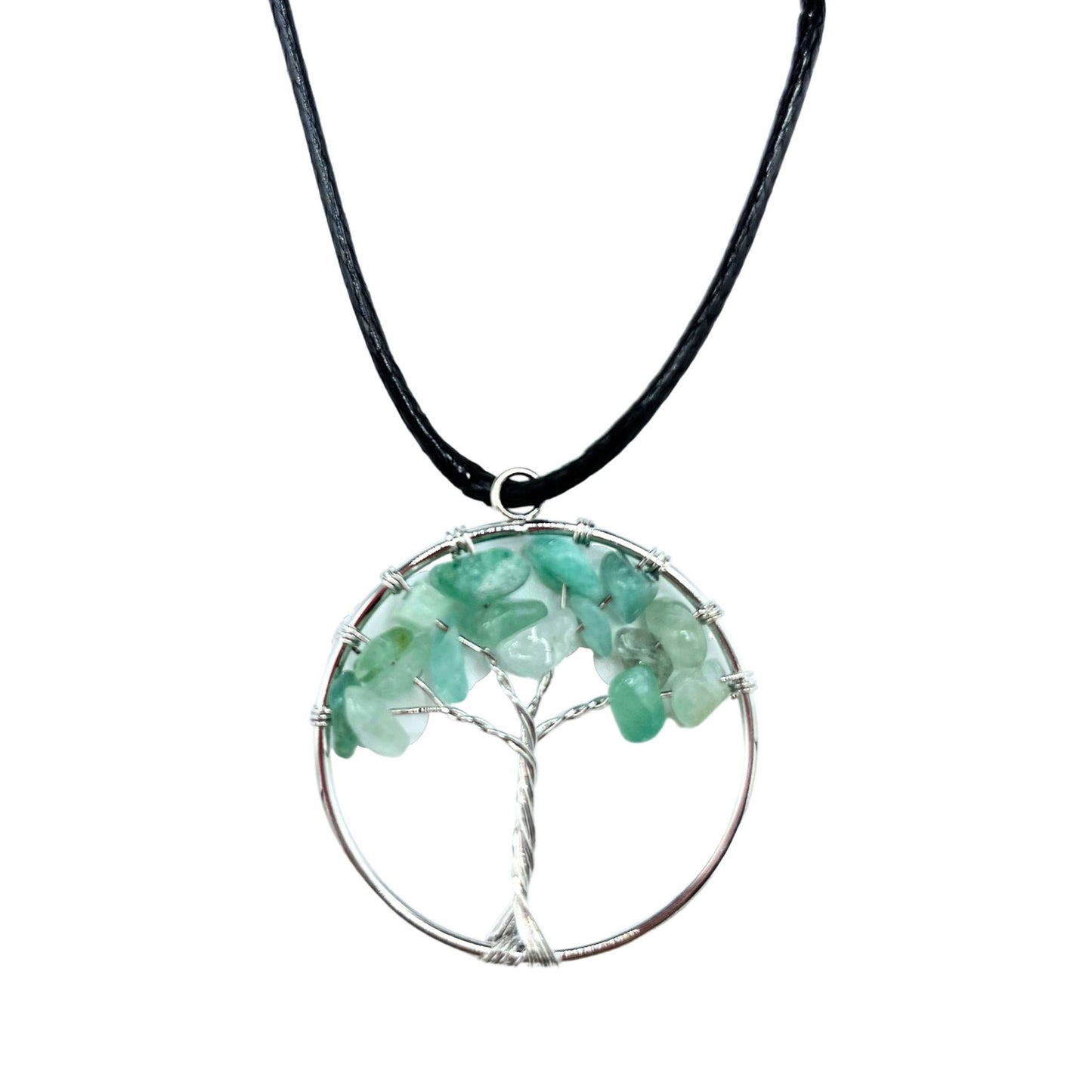 Image of a women's tree of life pendant featuring beautiful Jade gemstones, symbolizing elegance and sophistication. Front close up image