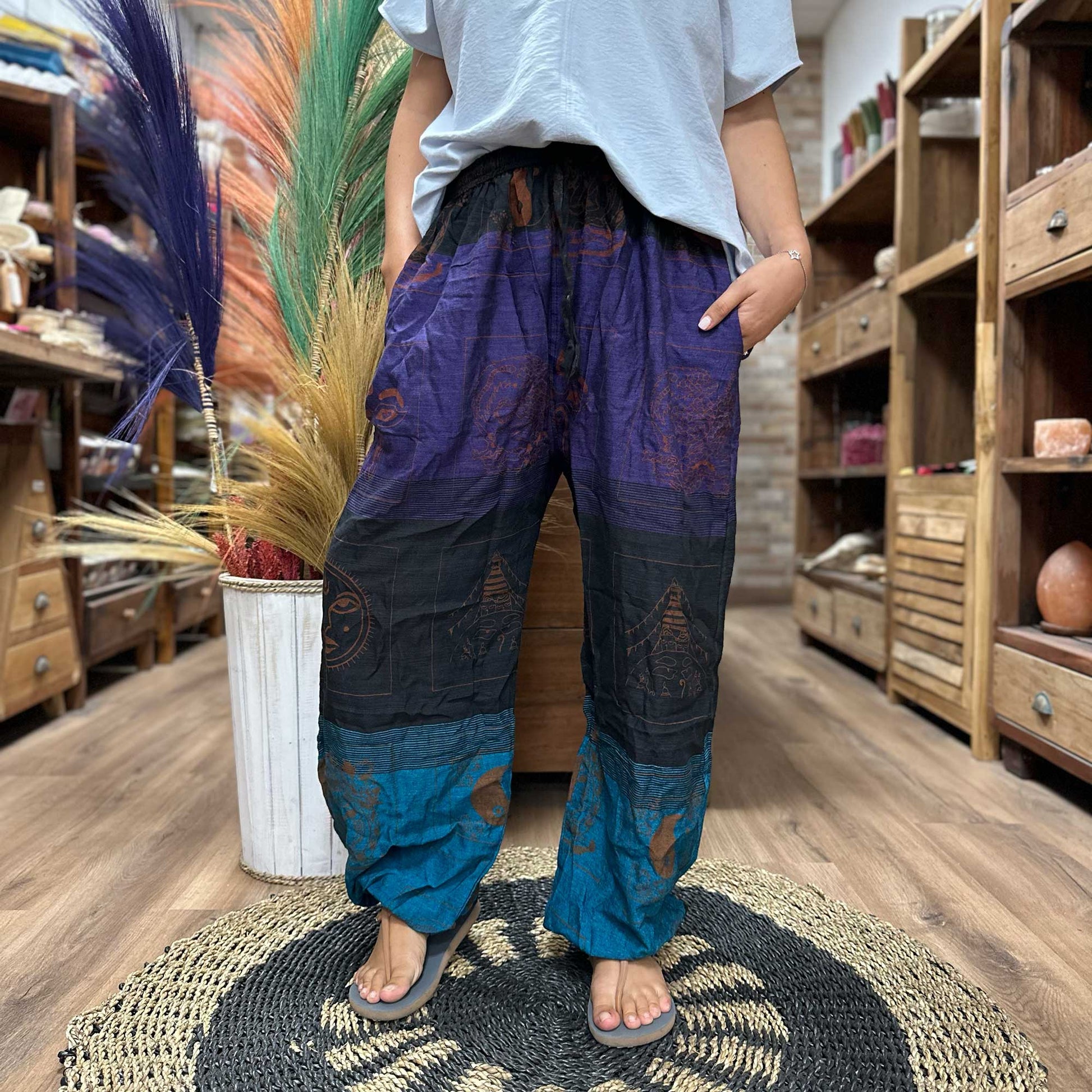 Person wearing High Cross Yoga & Festival Pants, Himalayan print on purple