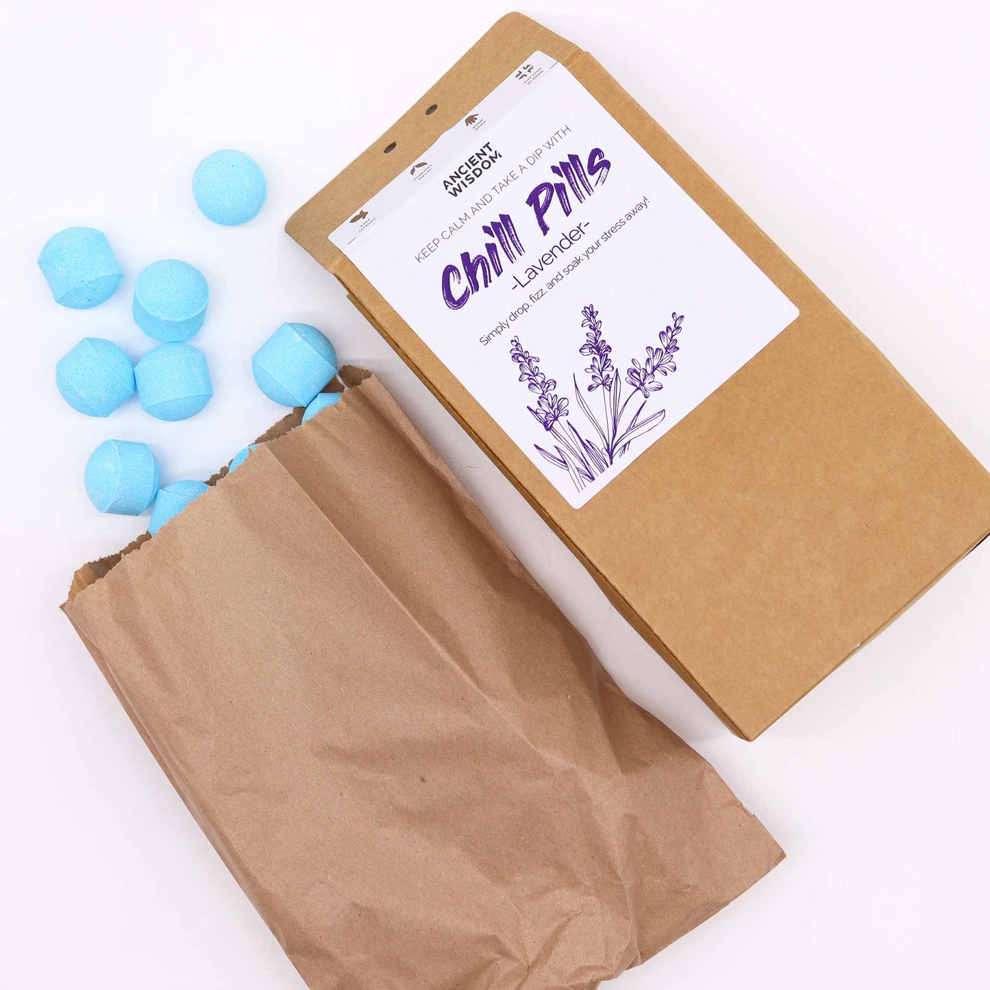 Bath bombs gift set, showing packaging and a few mini bath bombs in Lavender, chill pills on the label