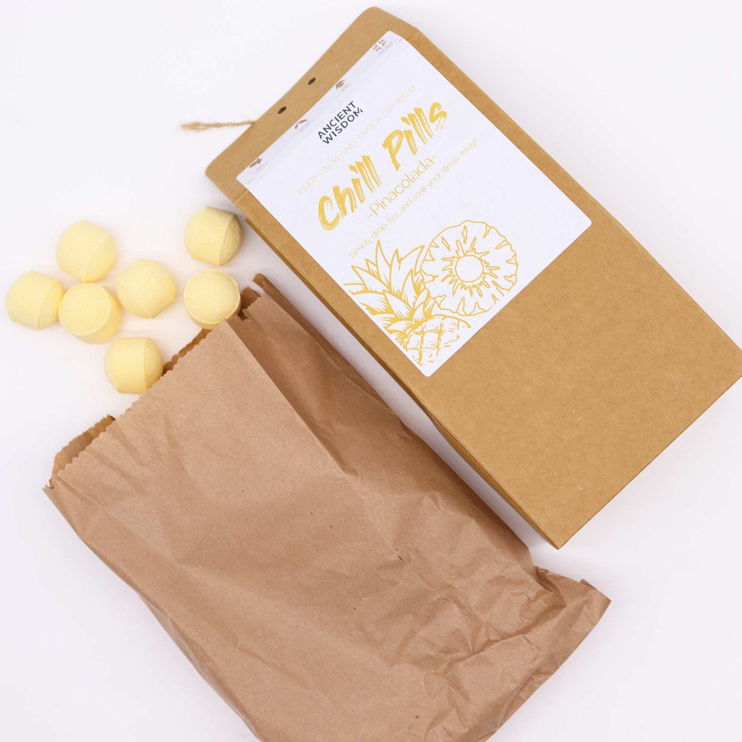 Bath bombs coming out of brown packaging, relaxing bath product