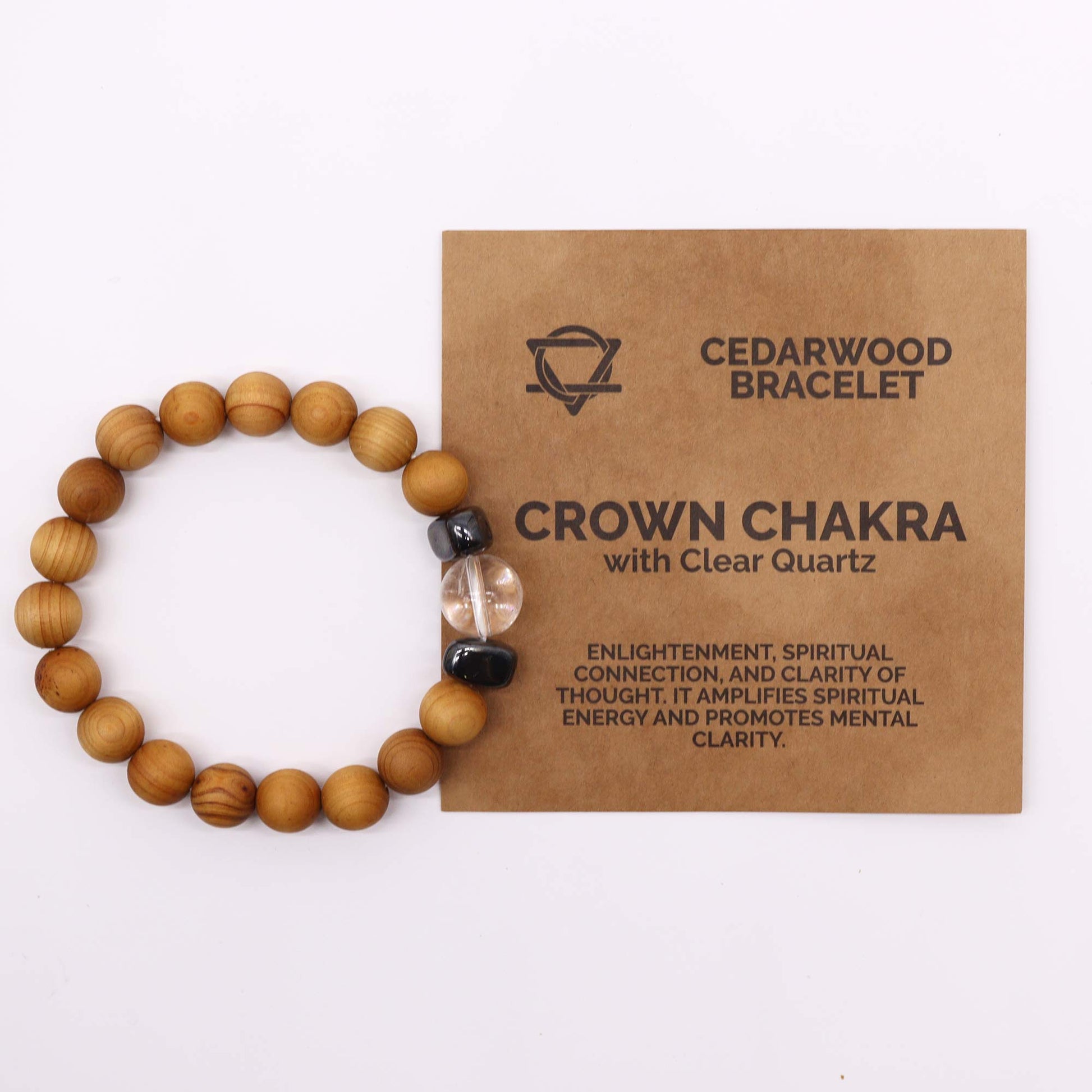 Handcrafted unisex cedarwood and gemstone bracelet with 7cm diameter, featuring natural wooden beads and vibrant gemstones, perfect for eco-friendly fashion. On white background, with packaging which states on the front, enlightenment, spiritual connection and clarity of thought. It amplifies spiritual energy and promotes mental clarity.