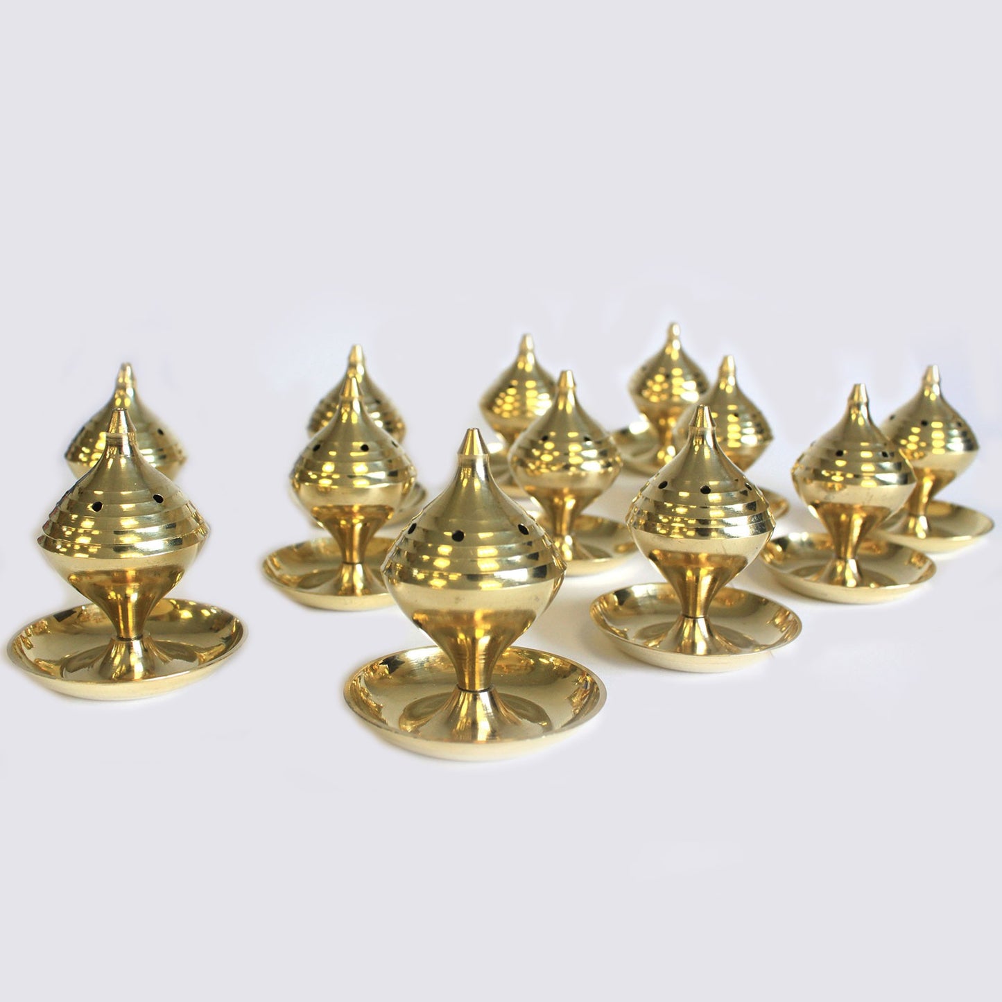 Image shows 12 med incense burners for effect, brass