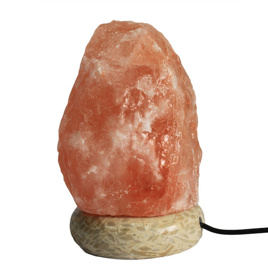 Orange salt lamp on base