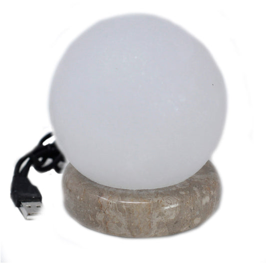 Round white himalayan salt lamp, stone base and usb connector visable