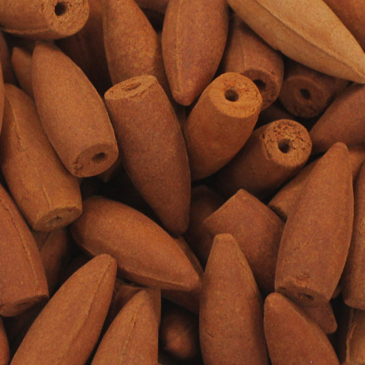 Image of back flow incense cones- sandalwood, close up image 