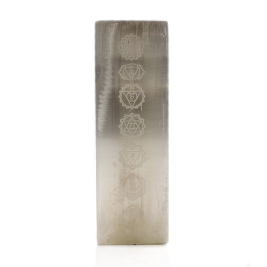 Image: Handcrafted Selenite Block Lamp emitting soft glow, promoting tranquility and elegance in any space. Chakra design