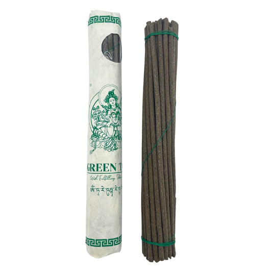 Image shows packaging and the sticks side by side.Handmade Tibetan incense sticks in Green Tara fragrance, ideal for meditation and relaxation, crafted in Tibet.