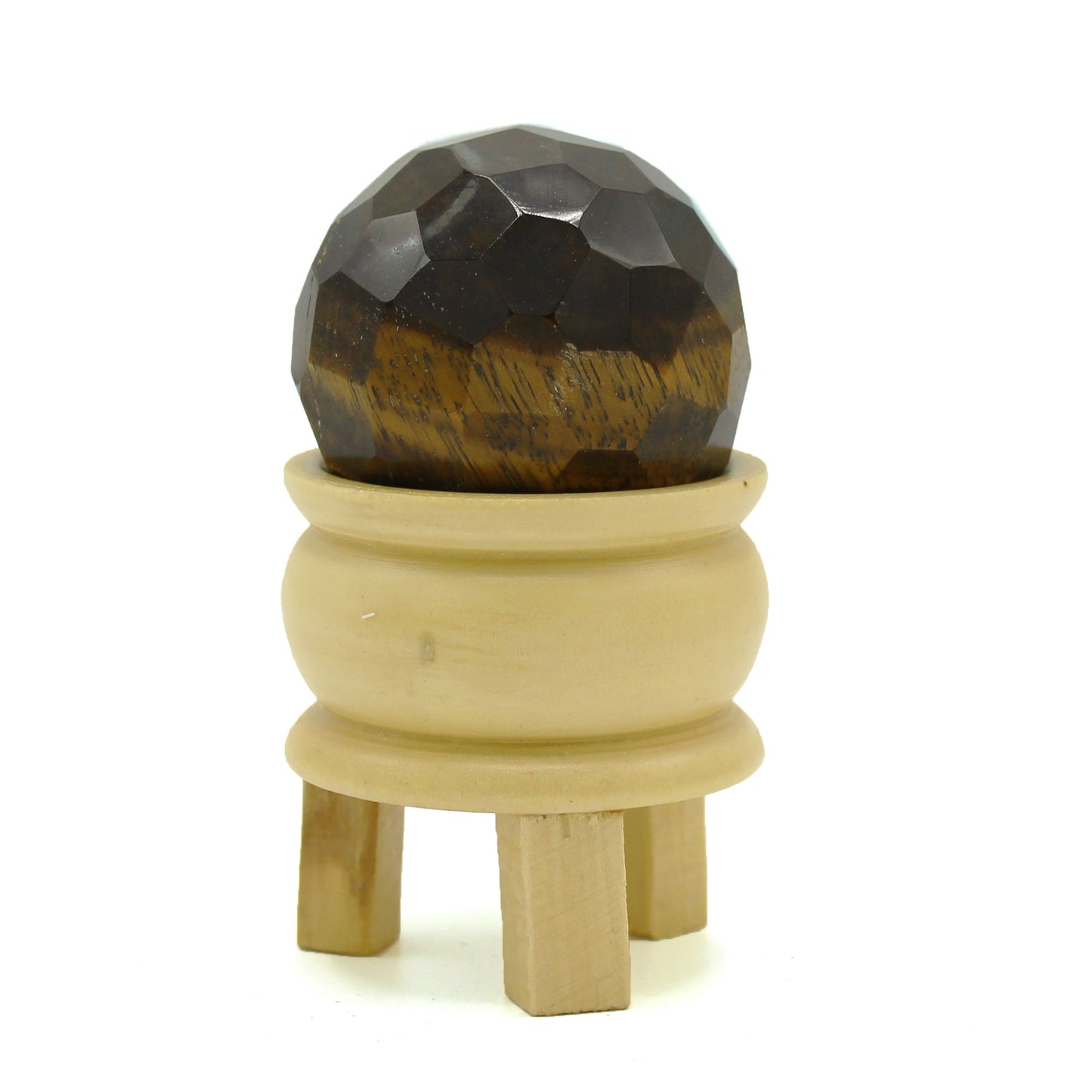 Image of a Tigereye Gemstone Faceted Healing Ball with wooden stand and complementary spheres, perfect for meditation and healing practices. Image shown against a white background for clarity