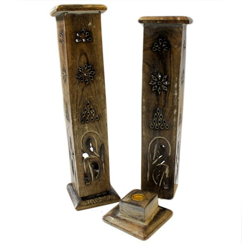 Image shows 2 smoke tower incense sticks, incense cone holders and buurners. Intricate detail carved into the special wood